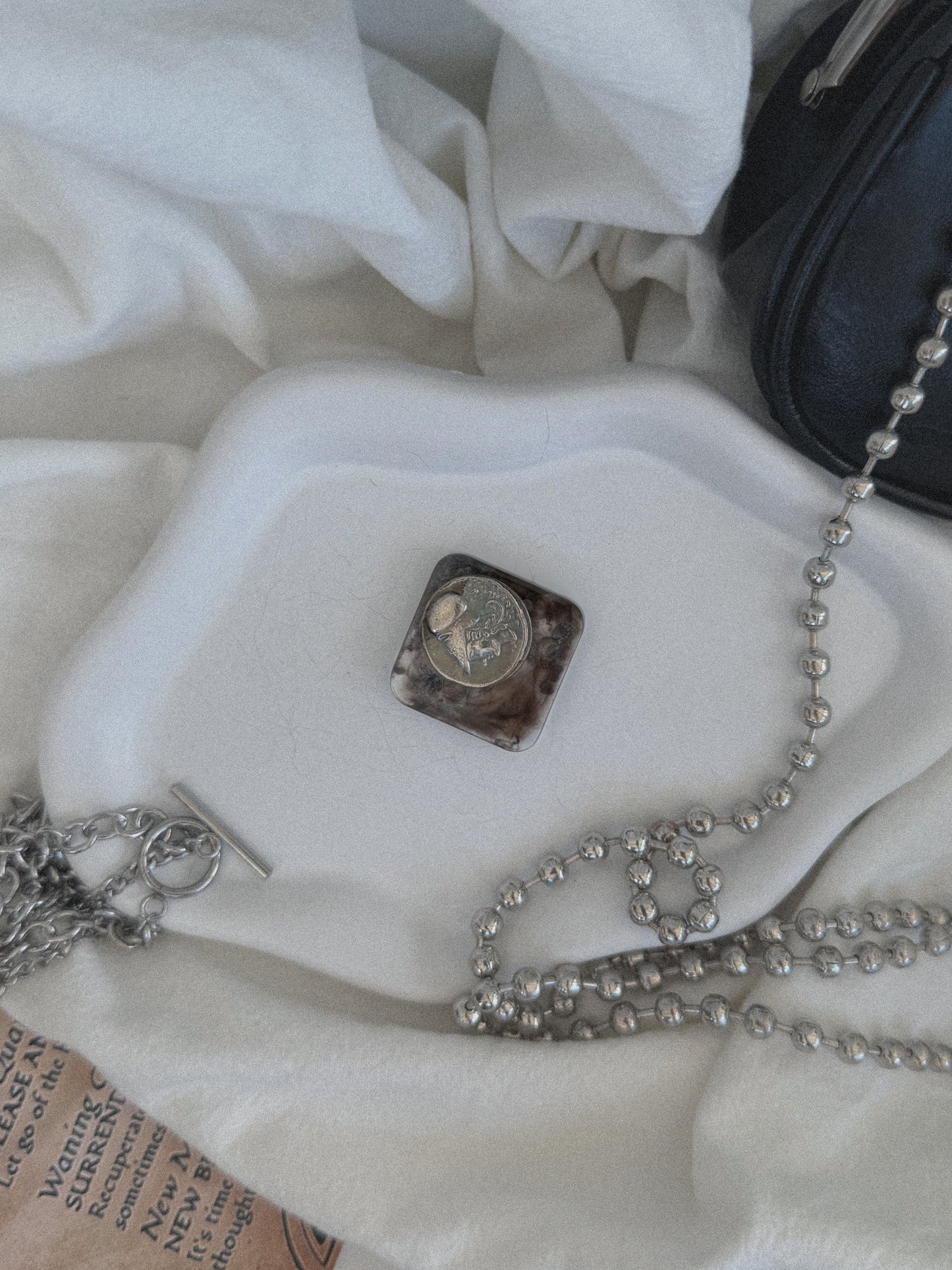 Mini square Roman coin