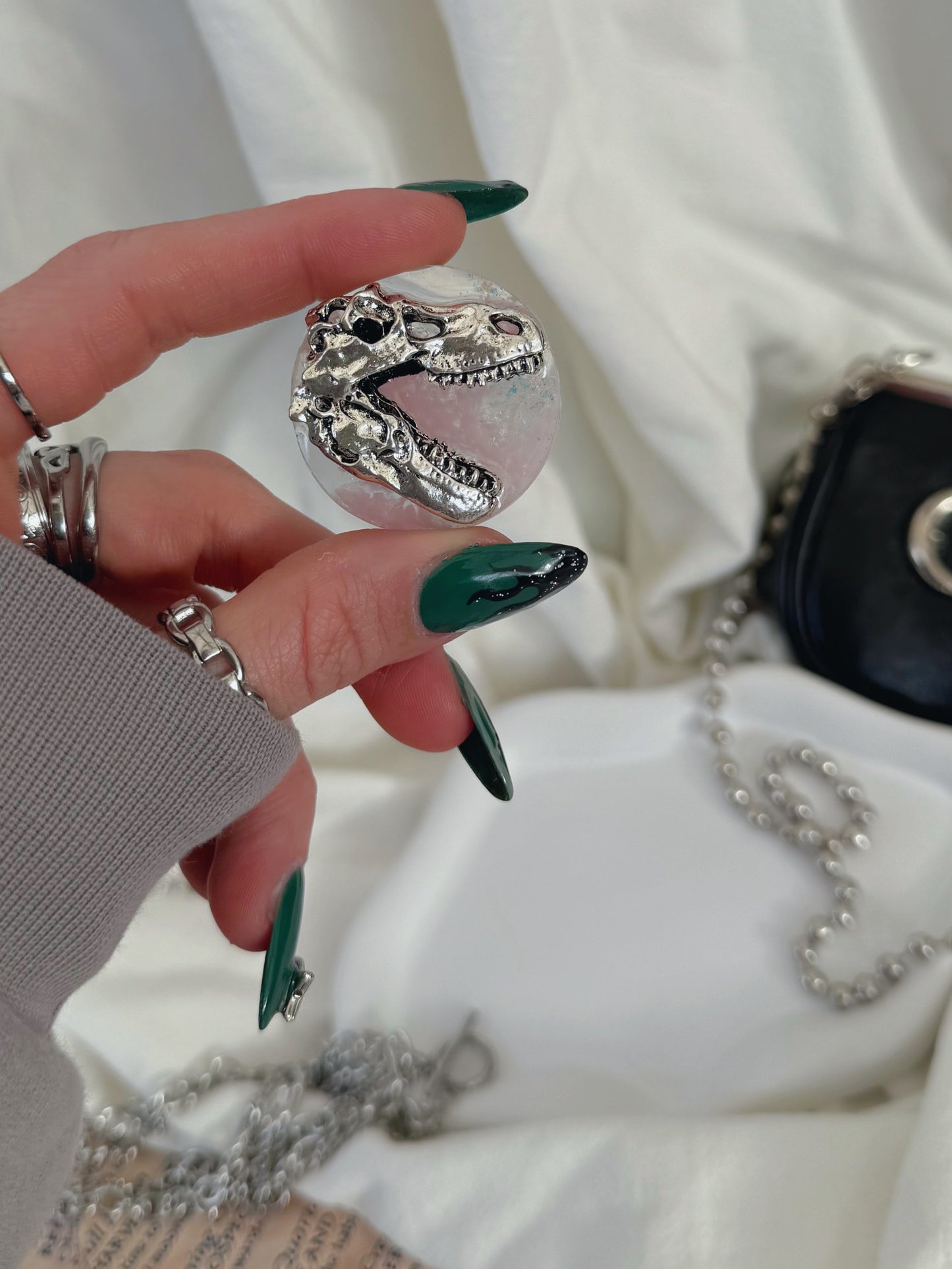 Holographic orb: pink dinosaur