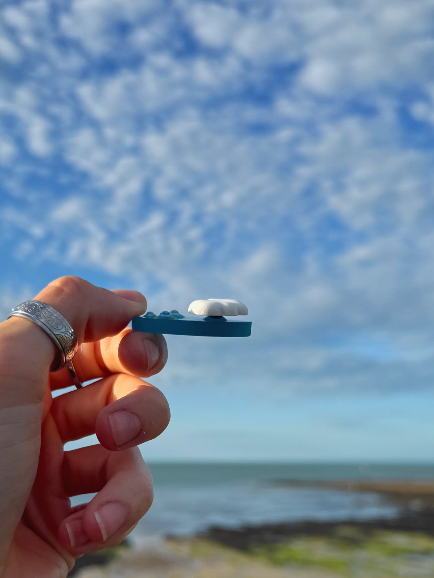 Micro over rain cloud spinner