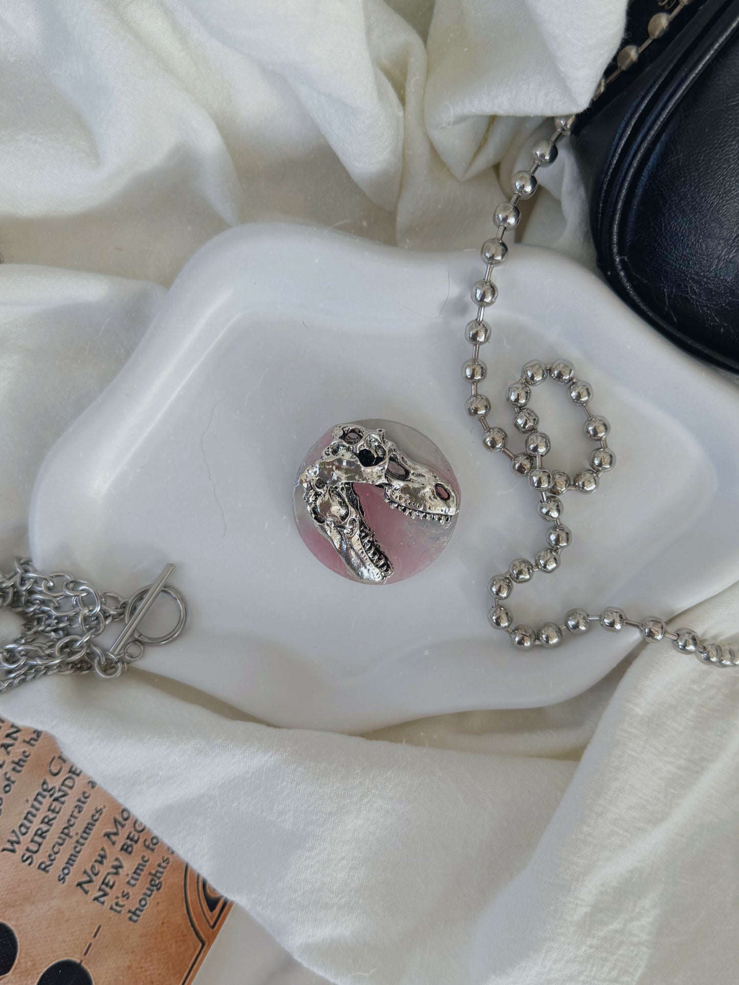 Holographic orb: pink dinosaur