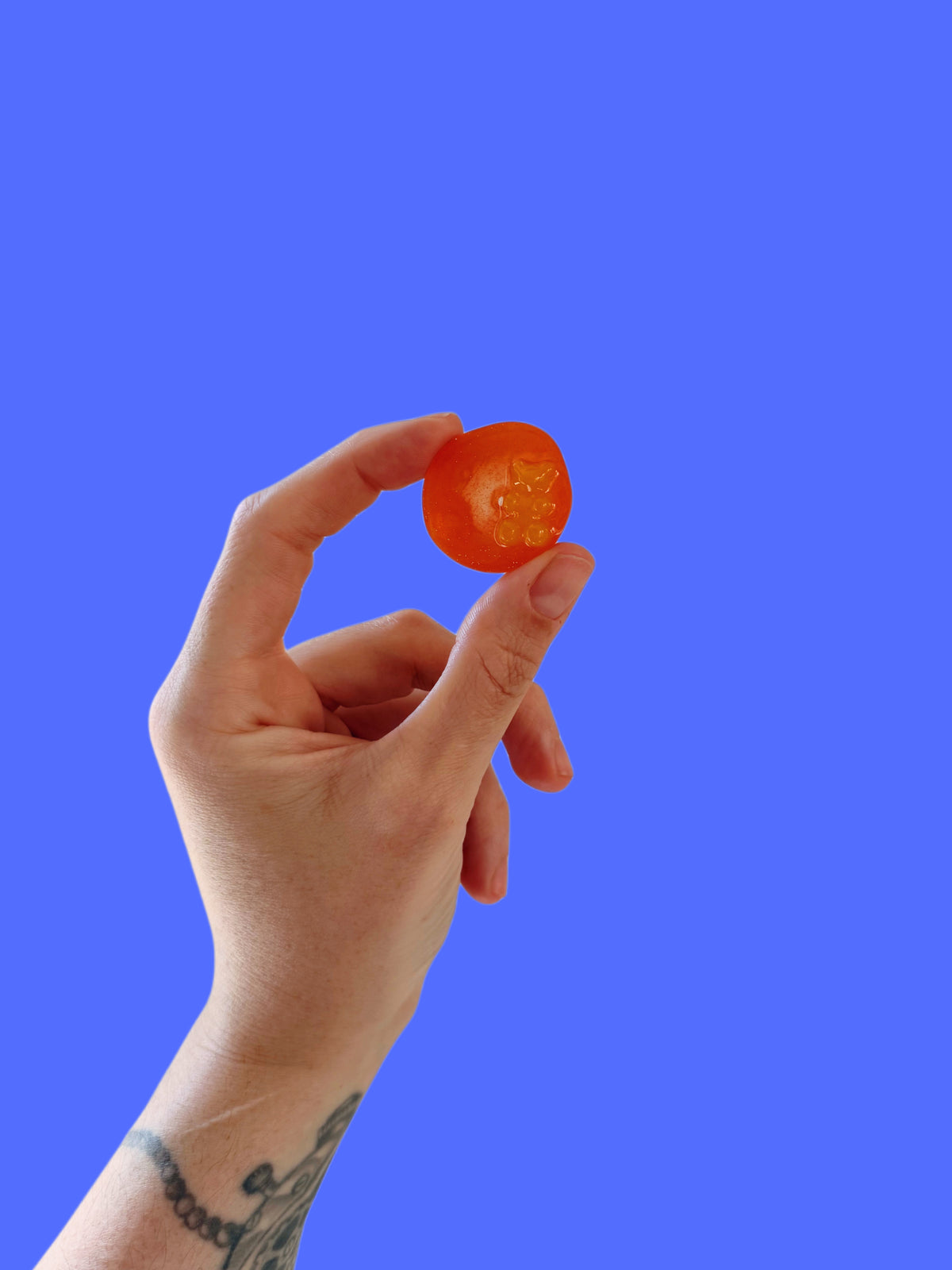 Orange gummy bear : thumb dip