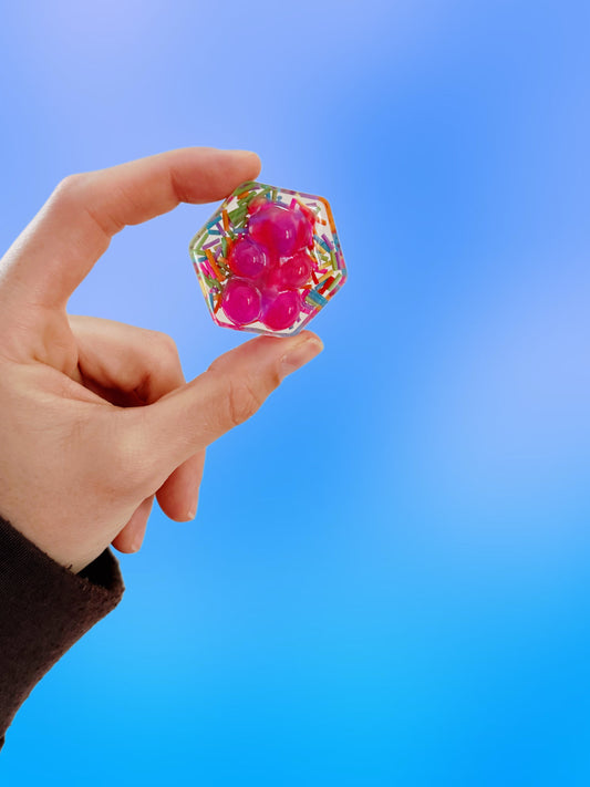 Hot pink gummy hexagon orb