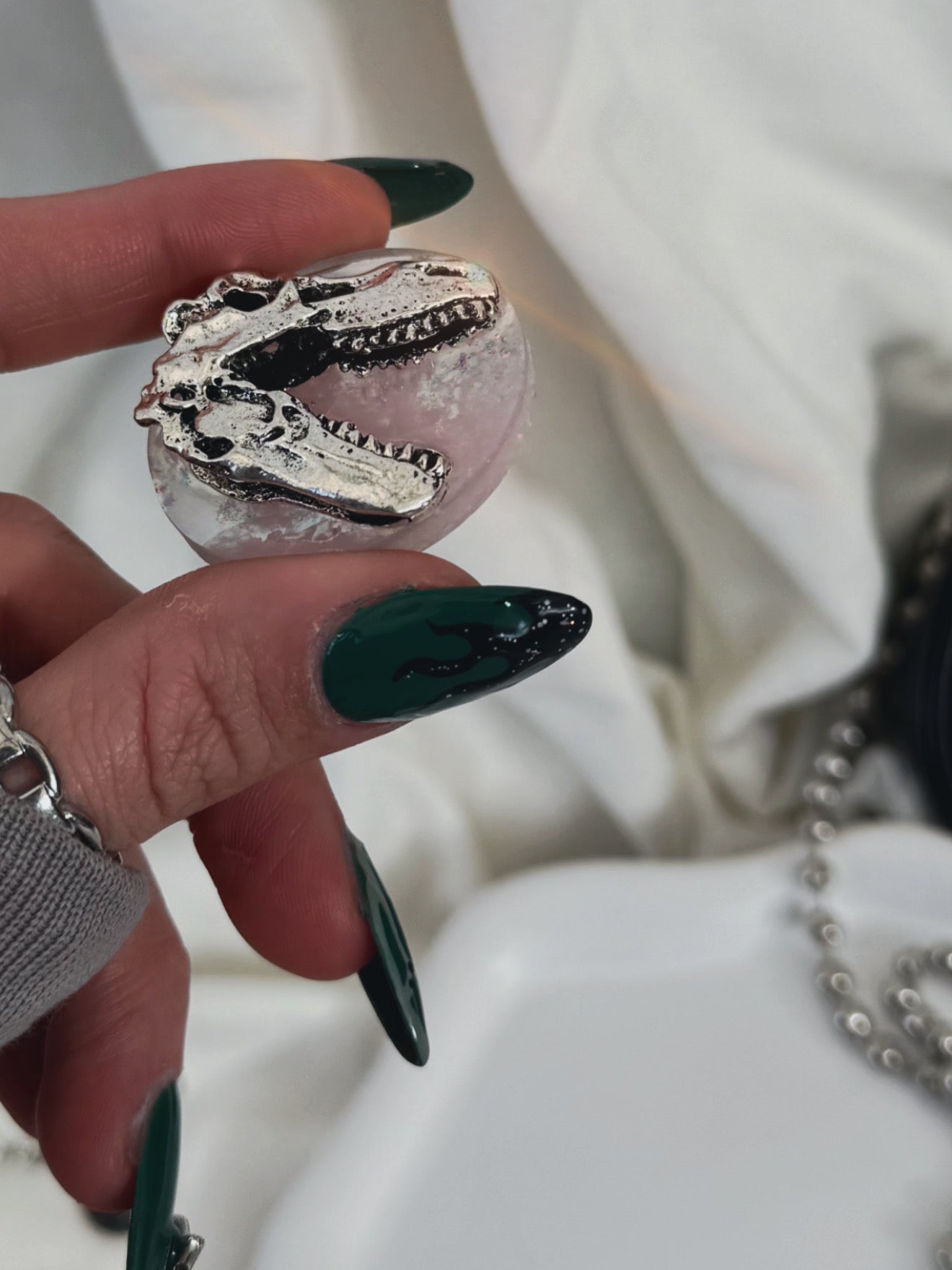 Holographic orb: pink dinosaur