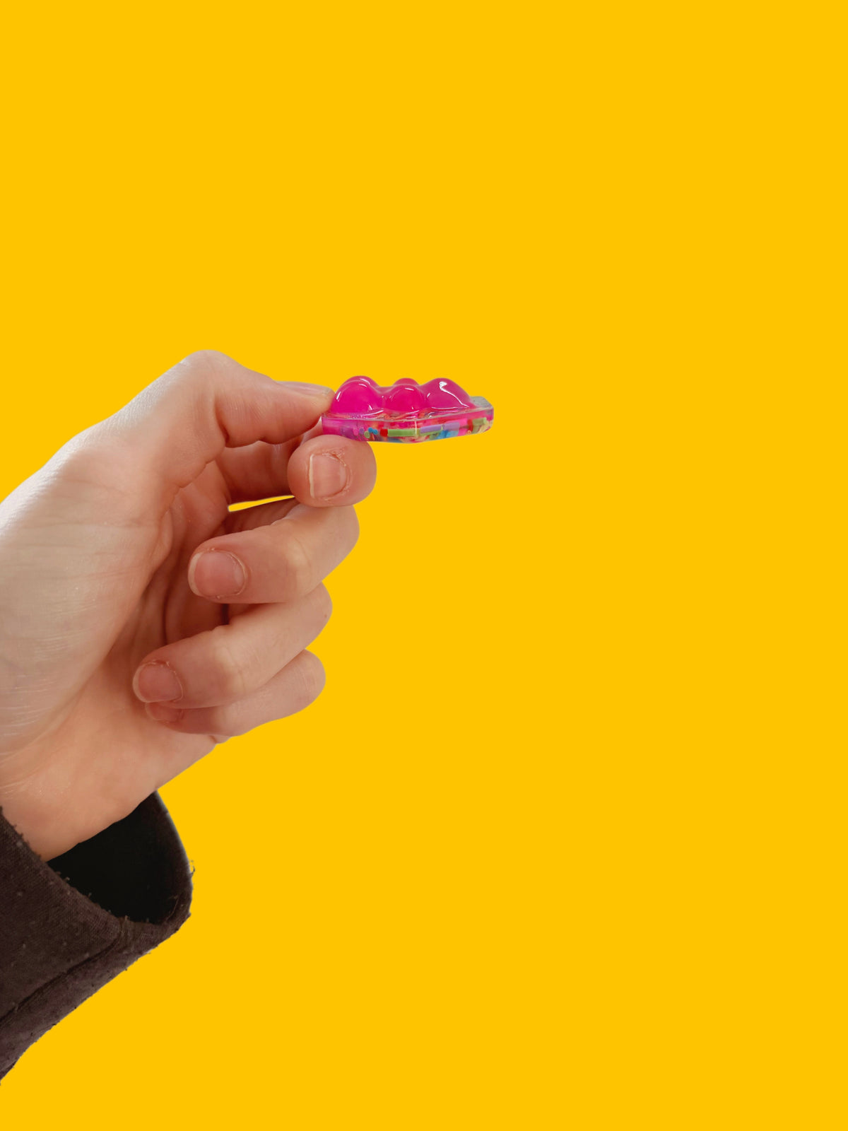 Hot pink gummy hexagon orb