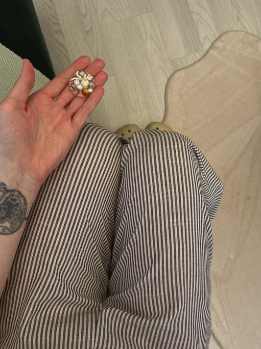 Micro orb: sad beige baby